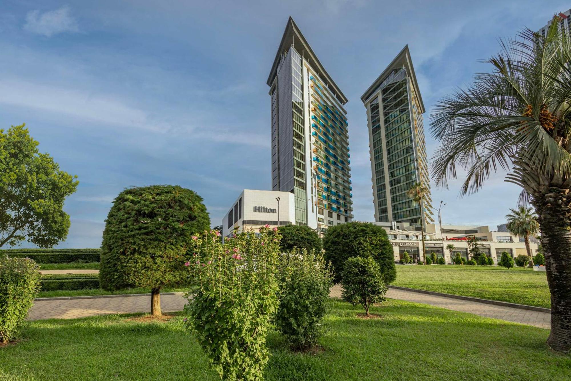 Hilton Batumi Hotel Exterior foto Residential buildings in the new city of El Alamein