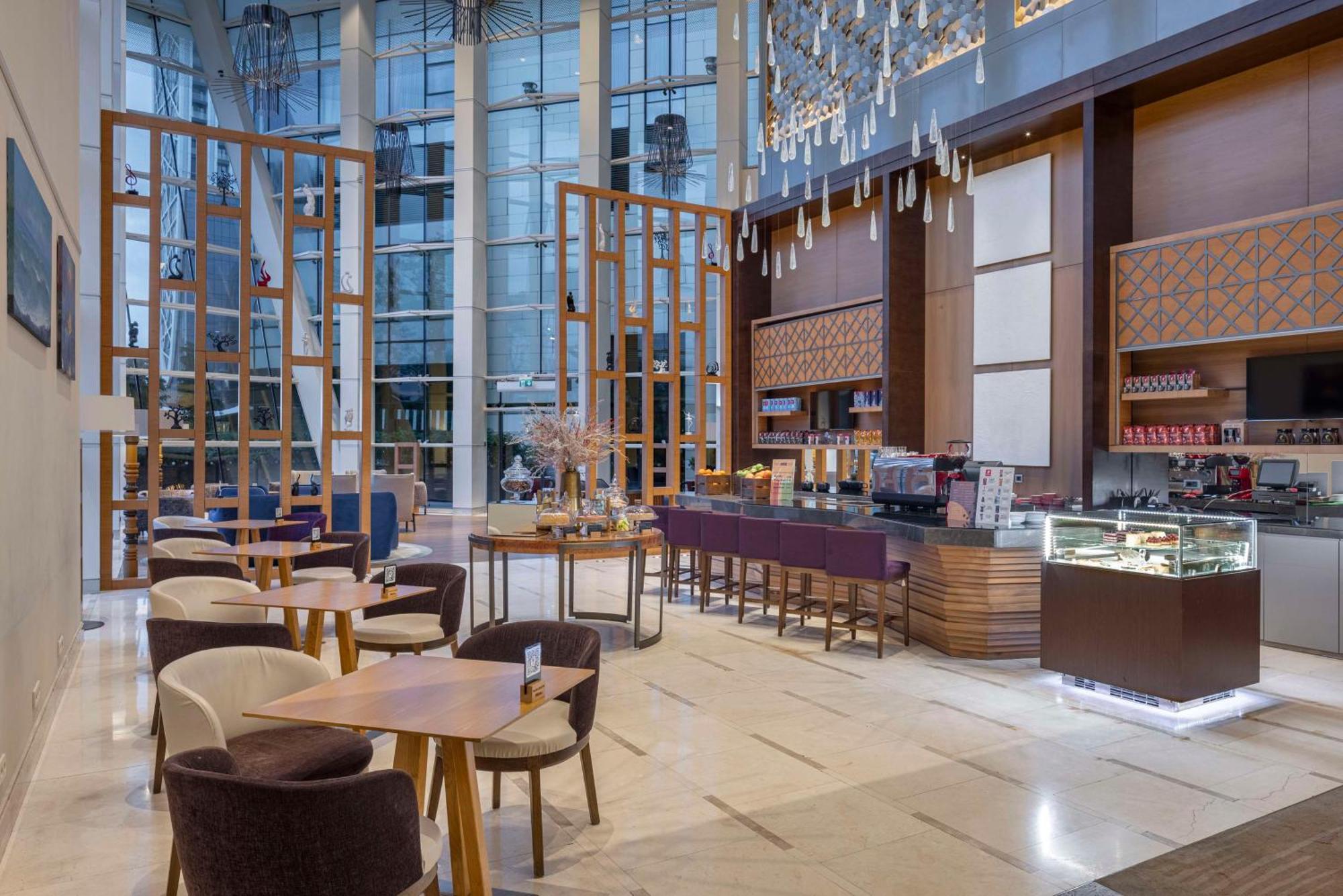 Hilton Batumi Hotel Exterior foto The Lounge at the airport
